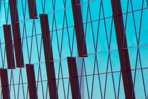 Abstract glass surface with geometric triangular shapes and dark inserts of o 写真素材