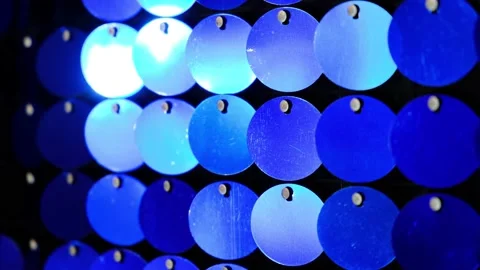 Abstract glitter blinking blue background. Wall of shining holiday decoration. Stock Footage 144347692