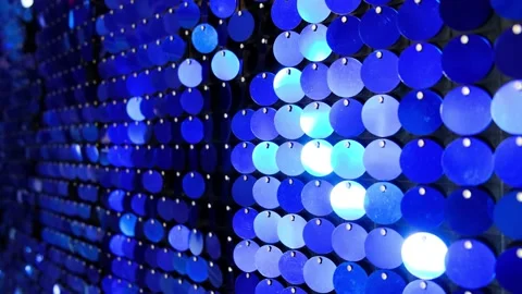 Abstract glitter blinking blue background. Wall of shining holiday decoration. Stock Footage 144419437