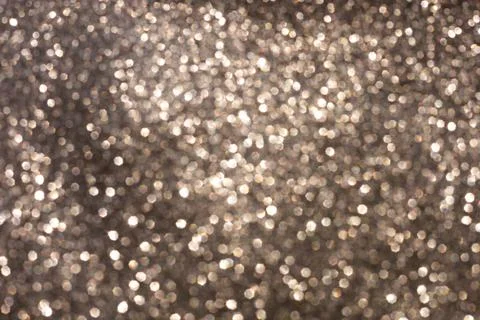 Abstract glitter lights textured background Stock Photos