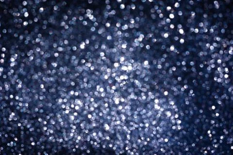 Abstract glitter lights textured background Stock Photos
