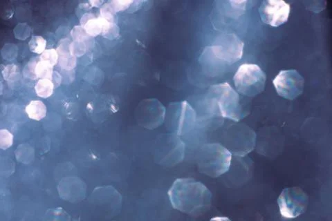 Abstract glitter lights textured background Stock Photos