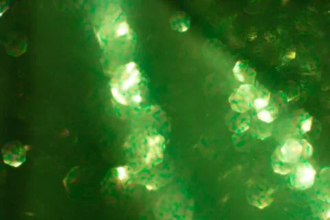 Abstract glitter lights textured background Stock Photos