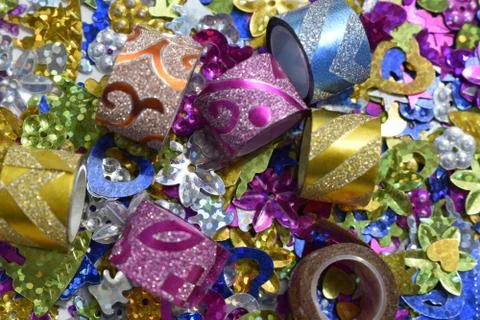 Abstract glittering shine elements with multicolor tapes. Stock Photos