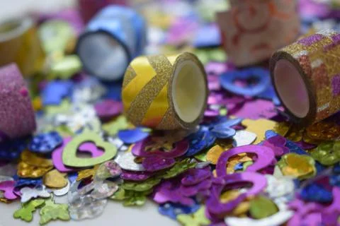 Abstract glittering shine elements with multicolor tapes. Stock Photos