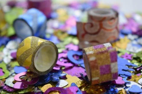 Abstract glittering shine elements with multicolor tapes. Stock Photos