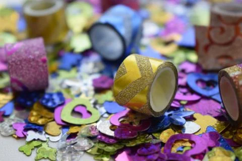 Abstract glittering shine elements with multicolor tapes. Stock Photos