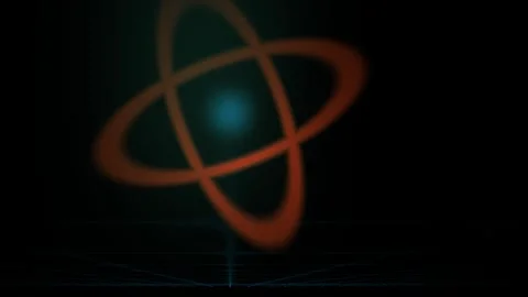 Abstract glowing atom model with orbiting rings on black background. Stock Footage 335504384