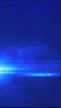 Abstract glowing blue light rays with particles on a dark futuristic backgrou Illustrazione stock