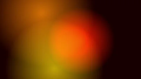 Abstract glowing bokeh circles in warm orange and yellow tones with subtle .. Stock Footage 340910425