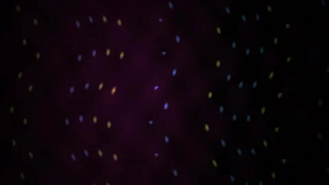 Abstract Glowing Bokeh Particles Drifting on a Dark Purple Background Stock Footage 344715405