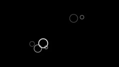 Abstract glowing bubble rings expanding and dissolving dynamically on black.. 스톡 동영상 346242865