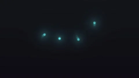 Abstract glowing dots create dynamic, futuristic patterns against a dark Video stock 325773104