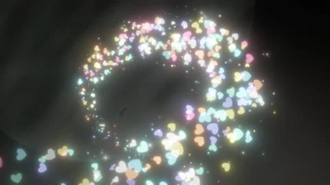 Abstract glowing heart particles flowing through dark space with ethereal light Stock Footage 345332540