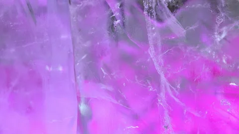 Abstract glowing ice texture illuminated with vibrant pink light. Stock Footage 321521436