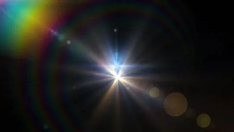 Abstract glowing light flare radiating across dark background with prism colors 库存影片 344262982