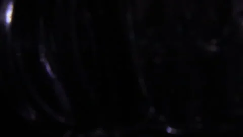 Abstract glowing lights with a special shape in the black Видео 309238937