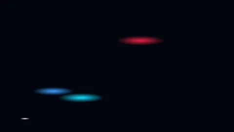 Abstract glowing particles drift in dark space with subtle cinematic motion.. Stock Footage 340939638