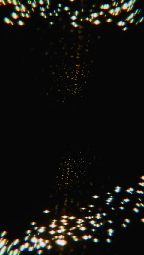 Abstract glowing particles swirl in dark space background Stock Footage 346663862