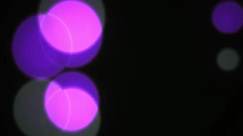 Abstract glowing purple and blue bokeh light circles moving on black backgr.. Stock Footage 346338001