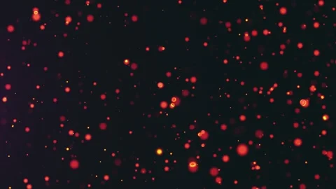 Abstract glowing red and orange particles floating on a dark background Stock Footage 312814680