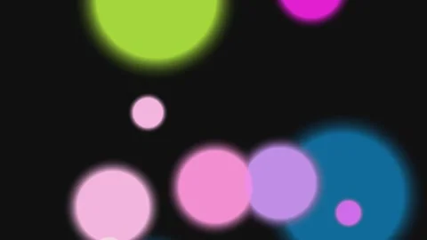 Abstract Glowing Spheres on Dark Background Stock Footage 332036414