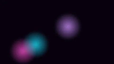 Abstract Glowing Spheres gently pulsing in dark void with shallow depth of .. Stock Footage 340911990