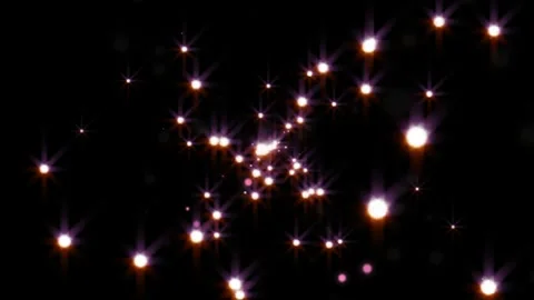 Abstract glowing star particles floating through deep space against dark night 스톡 동영상 345331284