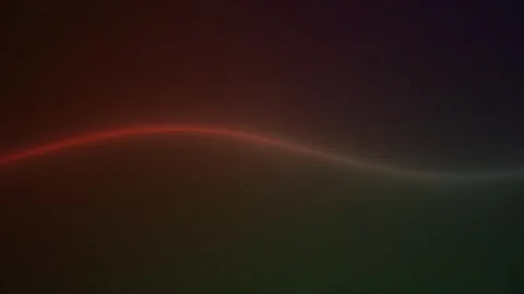 Abstract glowing wavy line across a dark textured background. Видео 334477851