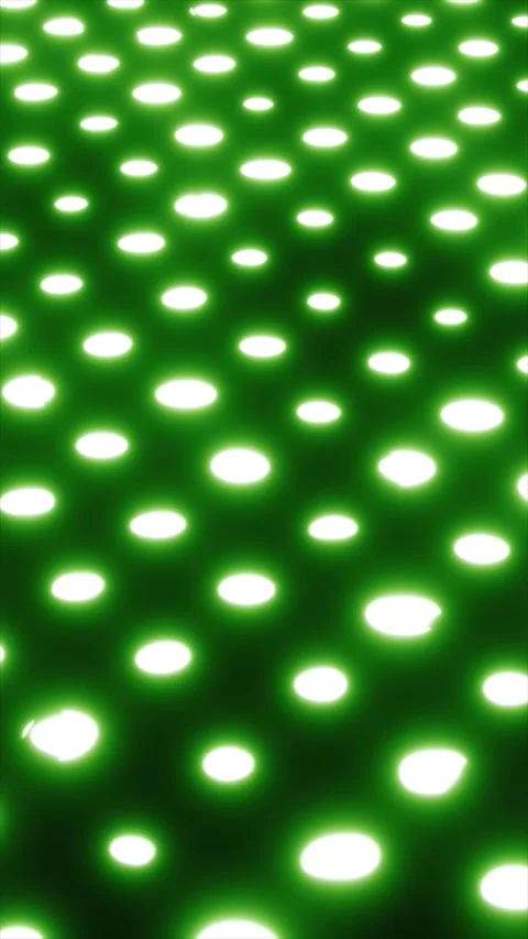Abstract glowing white oval lights arranged in a soft diffused grid over a .. Video stock 321836177