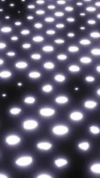 Abstract glowing white oval lights arranged in a soft diffused grid over a .. Stock Illustration