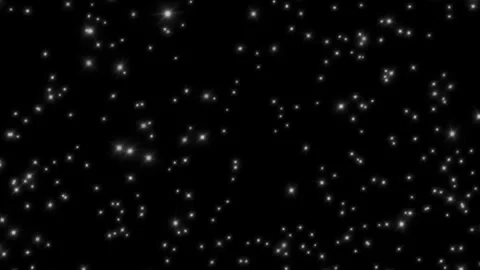 Abstract glowing white particles floating slowly across deep dark black void 스톡 동영상 345330485