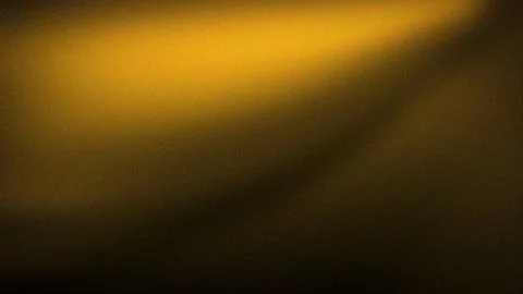 This abstract gold black gradient background features a grainy texture creati Stock Illustration