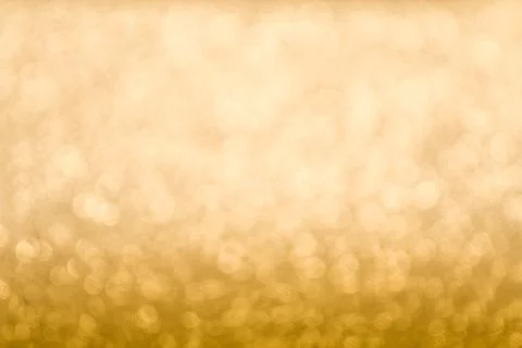 Abstract gold bokeh celebration background Stock Photos