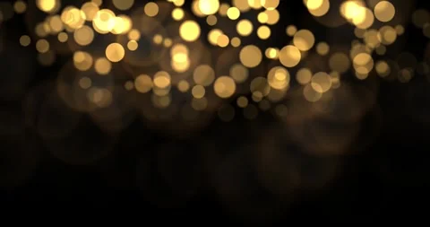 Abstract gold bokeh lights particle on black background Vídeos de archivo 328575344