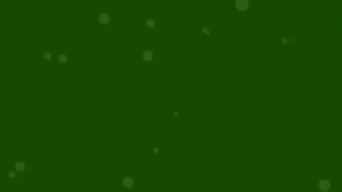 Abstract gold confetti falling animation background loop on solid olive green Stock Footage 336505845