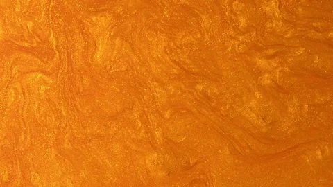 Abstract gold glitter motion background. Golden liquid gold abstract texture. Stock Footage 107618521