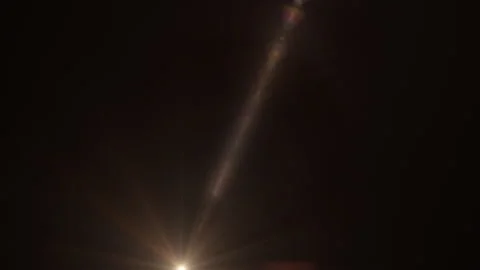Abstract gold optical flare light from bottom left to right Video stock 300580554