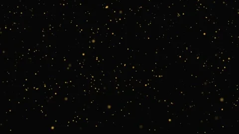 Abstract gold particles and glitter floating on a dark blurred background Video stock 339047797