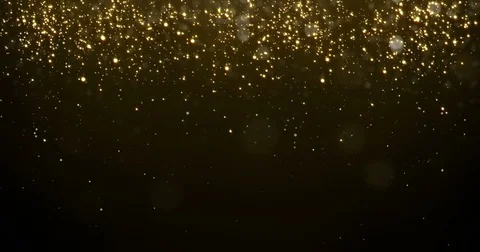 Abstract gold particles glitter light falling bokeh glare effect. Looped Stock Footage 84256225