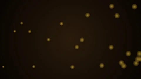 Abstract golden bokeh particles floating on a dark background texture Stockbeeldmateriaal 338309761
