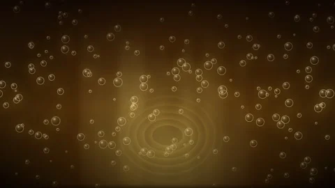 Abstract golden bubbles rising on amber liquid background Stock Footage 335862996