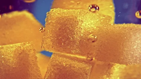 Abstract golden cubes falls into liquid and blow bubbles Stockbeeldmateriaal 122263194