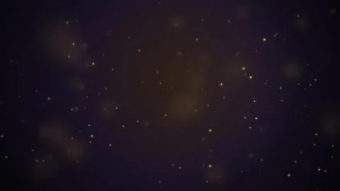 Abstract Golden Glitter Particles Floating on Dark Purple Background with Soft Stock Footage 345427680