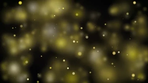 Abstract golden glitter particles floating and shimmering on a black background Stock Footage 346206831