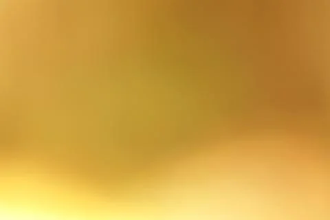Abstract golden gradient background creating a sense of warmth and fluidity.. Stock Photos