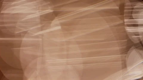 Abstract golden light bokeh effect with glowing blurred particles and soft .. Stock Footage 339429151