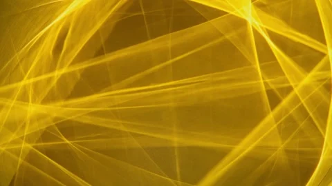 Abstract golden light lines creating a vibrant pattern and texture, forming an Stock Footage 330854392