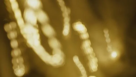 Abstract golden light patterns with blurred bokeh effect in background Foto stock