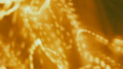 Abstract golden light patterns with blurred motion effect and copy space Stock Photos
